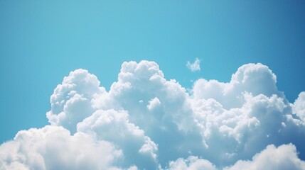 Heavenly Cumulus Cloudscape: A Breathtaking View of Fluffy White Clouds Against a Vivid Azure Sky