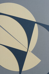 sophisticated machine-cut paper stencil with semi-circular cutout shapes