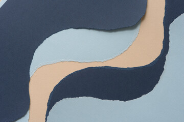abstract torn paper background in light and dark blue