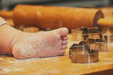 A family with children makes cookies. Close-up