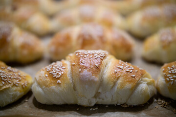 Close up of homemade mini croissants on a sheet pan