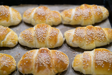Homemade mini croissants on a sheet pan