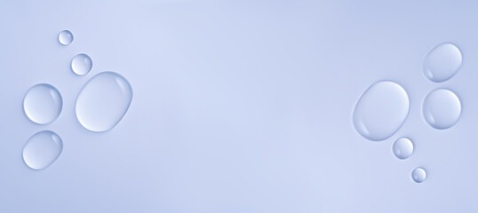 Top view of liquid cosmetics gel with bubbly structure on blue background. Good as cosmetic mockup, banner.