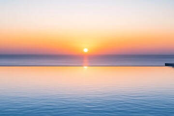 Fototapeta premium view from luxury hotel terrace to a calm sea reflecting a vibrant, orange-hued sunset sky, creating a tranquil and picturesque view, minimal background with copy space