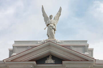 Angel with a trumpet statue at the facade of the Cathedral Basilica of Our Lady of the Assumption in downtown Santiago de Cuba © Alexandre