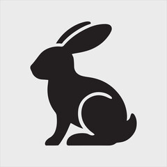 Minimalist Rabbit Silhouette Sitting in Relaxed Pose with Pointed Ears Vector Illustration