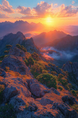 Photo réaliste d’un lever de soleil depuis un sommet montagneux, éclairant les cimes et projetant de longues ombres