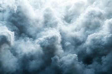 Fototapeta premium Dramatic dark clouds gather above creating a moody atmosphere in the sky