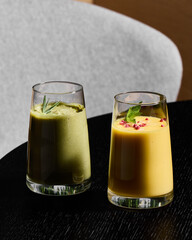 An Array of Refreshing and Vibrantly Colorful Smoothies Artfully Displayed on a Dining Table