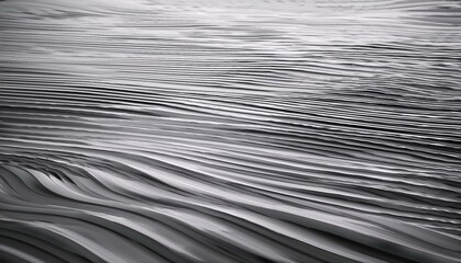Abstract grayscale image of flowing, layered textures.  Subtle light and shadow create depth.