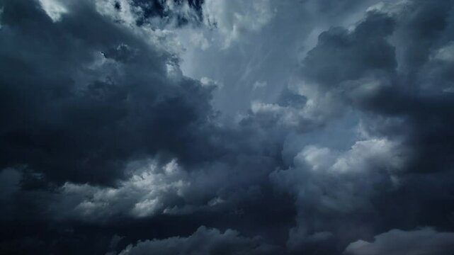 Lot of lightning during a thunderstorm. Storm clouds are moving fast on the viewer, timelapse 4k