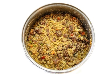 Authentic Brazilian farofa prepared with toasted cassava flour, bacon, onion and typical spices. Brazilian food
