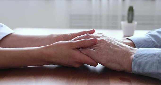 Close up changing videos of diverse people holding their hands, stroking, express care, enjoy moment of comfort and support. Gesture of empathy, connection, and emotional bonding between loving people