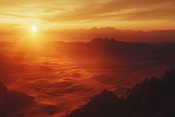 Naklejka premium Sunset illuminates rugged, red mountainscape.