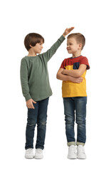 Cute brothers comparing their height on white background