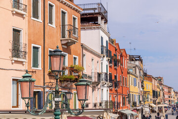 Italy, Venice. Arsenale neighborhood, Castello district. Streetlight and buildings.