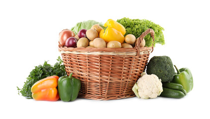 Different ripe vegetables in wicker basket isolated on white