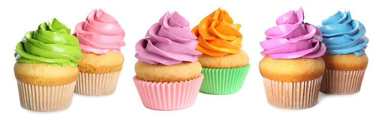 Yummy cupcakes with colorful cream isolated on white, set
