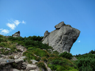 Unique rock formation in a mountainous landscape