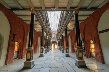 Obraz premium Europe, Germany, Pomerania, Mecklenburg-Vorpommern, Stralsund. Rathaus, city hall of town square central plaza. Gallery with columns. UNESCO World Heritage Site.