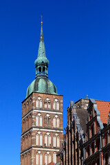 Fototapeta premium Europe, Germany, Pomerania, Mecklenburg-Vorpommern, Stralsund. Copper Steeple of Saint Nicholas Church. UNESCO World Heritage Site.