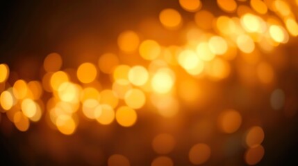 Obraz premium abstract background featuring glittering lights in vibrant blue and gold shades, scattered against a dark black gradient.