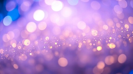 Fototapeta premium abstract background featuring glittering lights in vibrant blue and gold shades, scattered against a dark black gradient.