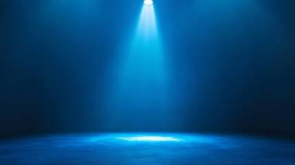 Blue Spotlight on Dark Stage Background
