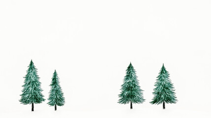 Obraz premium Snowy landscape with evergreen trees against a white background