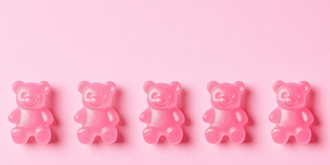 Colorful Gummy Bears on Minimal Pink Background