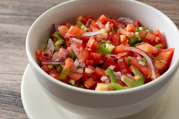 A view of a bowl of Ethiopian tomato salad.