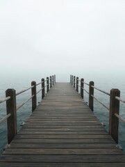 Fototapeta premium Empty wooden pier extending into a cloudy sea, wooden,background,minimal
