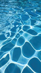 Obraz premium A serene view of shimmering blue water, capturing the intricate patterns of light reflecting off the surface.
