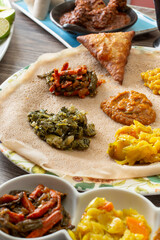 A view of a table full of assorted Ethiopian entrees.