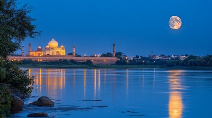 Obraz premium Serene Evening View of the Taj Mahal with a Full Moon Reflection on the Yamuna River, Illuminating the Iconic Mughal Architecture at Dusk