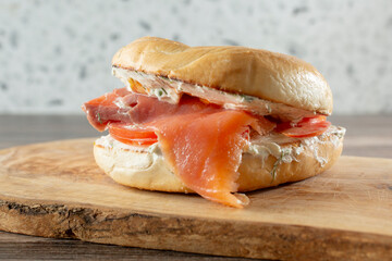 A view of a smoked salmon bagel sandwich.