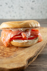 A view of a smoked salmon bagel sandwich.