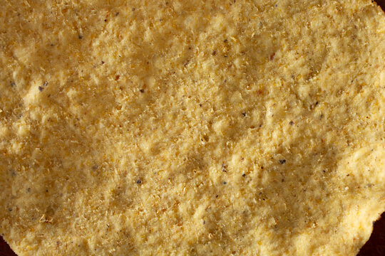 A top down view of a tostada shell, as a background.