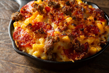 A closeup view of a pizza style mac n cheese entree.