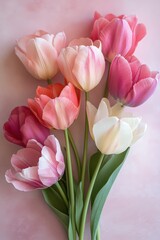 Obraz premium A bouquet of flowers with pink and white petals