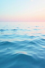 Obraz premium Gentle waves on a calm lake surface, with soft pastel colors in the abstract background, gentle waves, soft pastels, nature