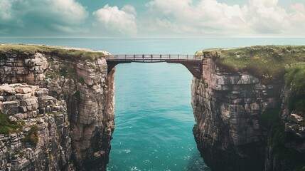 Dramatic cliff bridge spanning a deep canyon with turquoise blue waters below set against a backdrop of towering mountains and clouds in an natural landscape