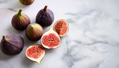 Ripe figs on a marble background. A healthy and delicious treat.