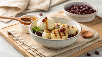 Grilled Mochi Bites Served with Sweet Sauce and Ice Cream