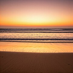 Obraz premium A serene beach background at sunset, with soft waves, golden sand, and a glowing orange-pink sky.