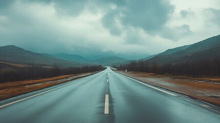 Endless Asphalt Road Through Majestic Mountains