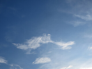 Nature’s Canvas: Soft Streaks of Cloud on a Vibrant Azure Background in Dong Hoi, Quang Binh, Vietnam