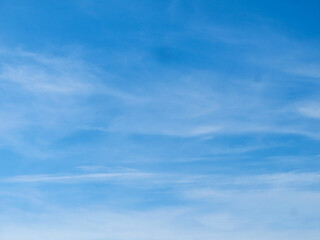 Obraz premium Minimalist Sky Beauty: Ethereal Cloud Streaks in a Pure Blue Sky in Dong Hoi, Quang Binh, Vietnam