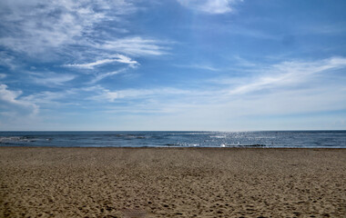 Clear Sky and Dynamic Cloud Patterns Over an Idyllic Ocean Scene in Dong Hoi, Quang Binh, Vietnam
