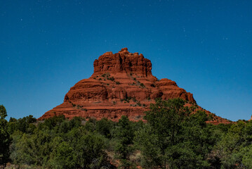 Bell Rock illuminated by the moon infront of the stars
